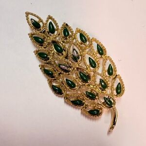 Elegant vintage gold tone and Green enameled filigree Leaf Brooch